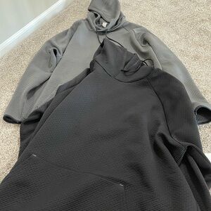 Two men’s Xersion hoodies